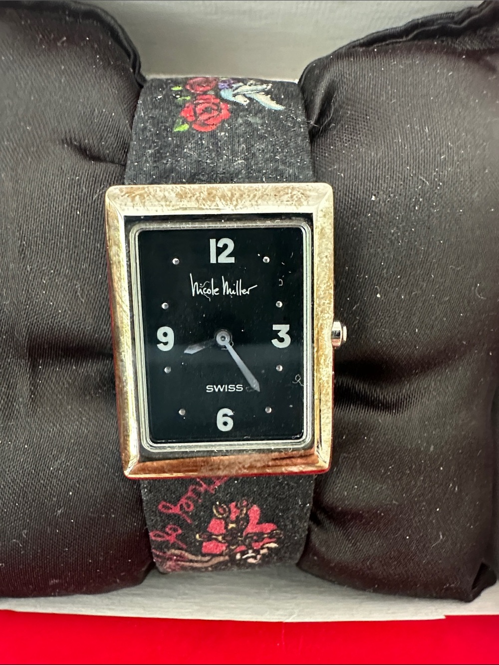Nicole Miller Gold-Tone Rectangular Watch with Black Dial and Floral Strap